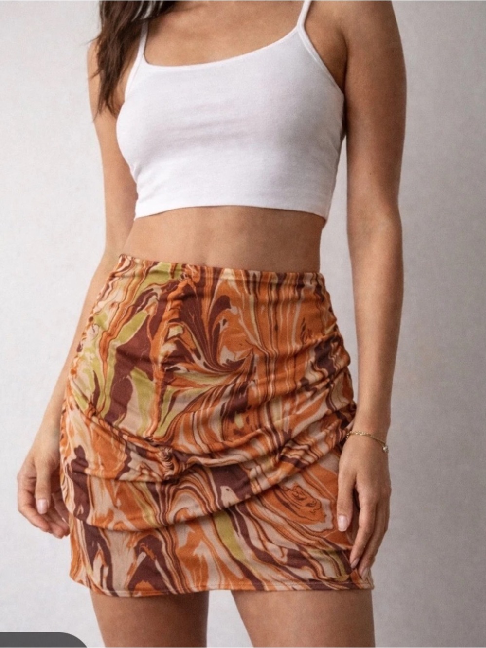 Urban outfitters brown orange and green marbled swirl mini skirt